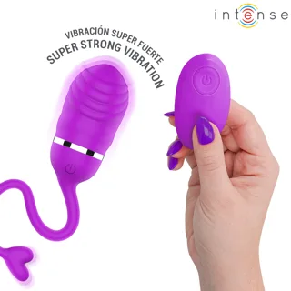 Œuf vibrant Sookie violet et télécommande tenue en main