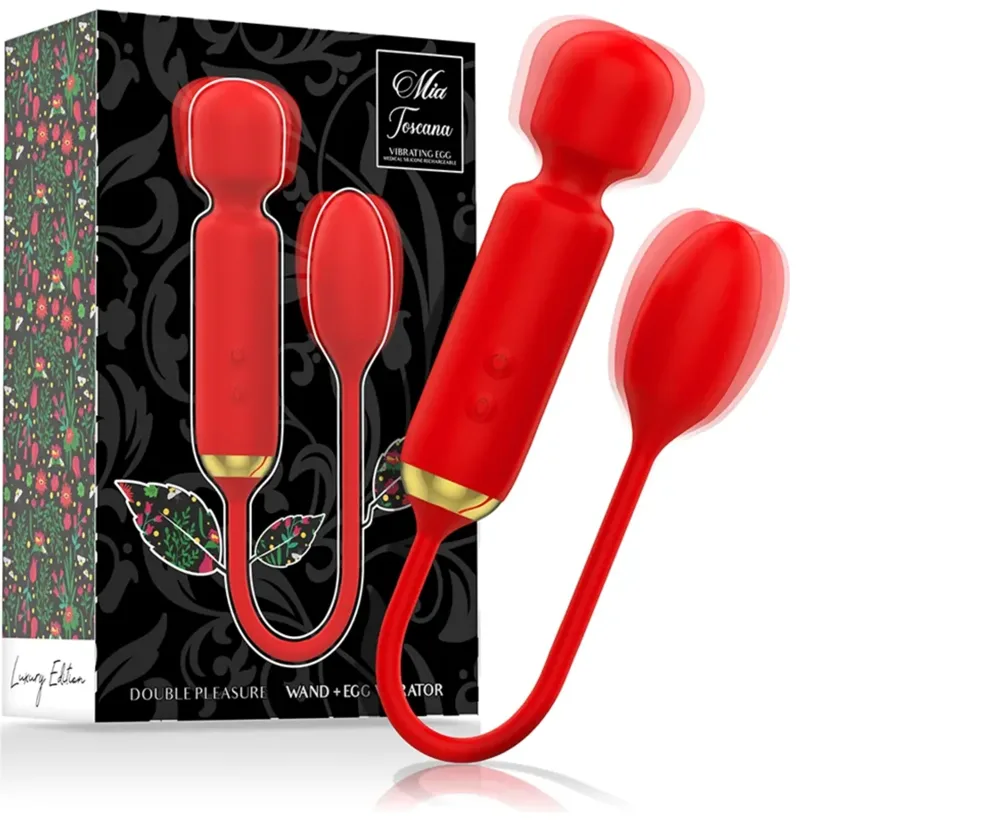 Mia Toscana, mini wand rouge relié à un œuf vibrant, devant son coffret Luxury Edition