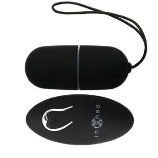 Œuf Vibrant Flippy Intense coloris noir, tenu en main pour juger de la taille