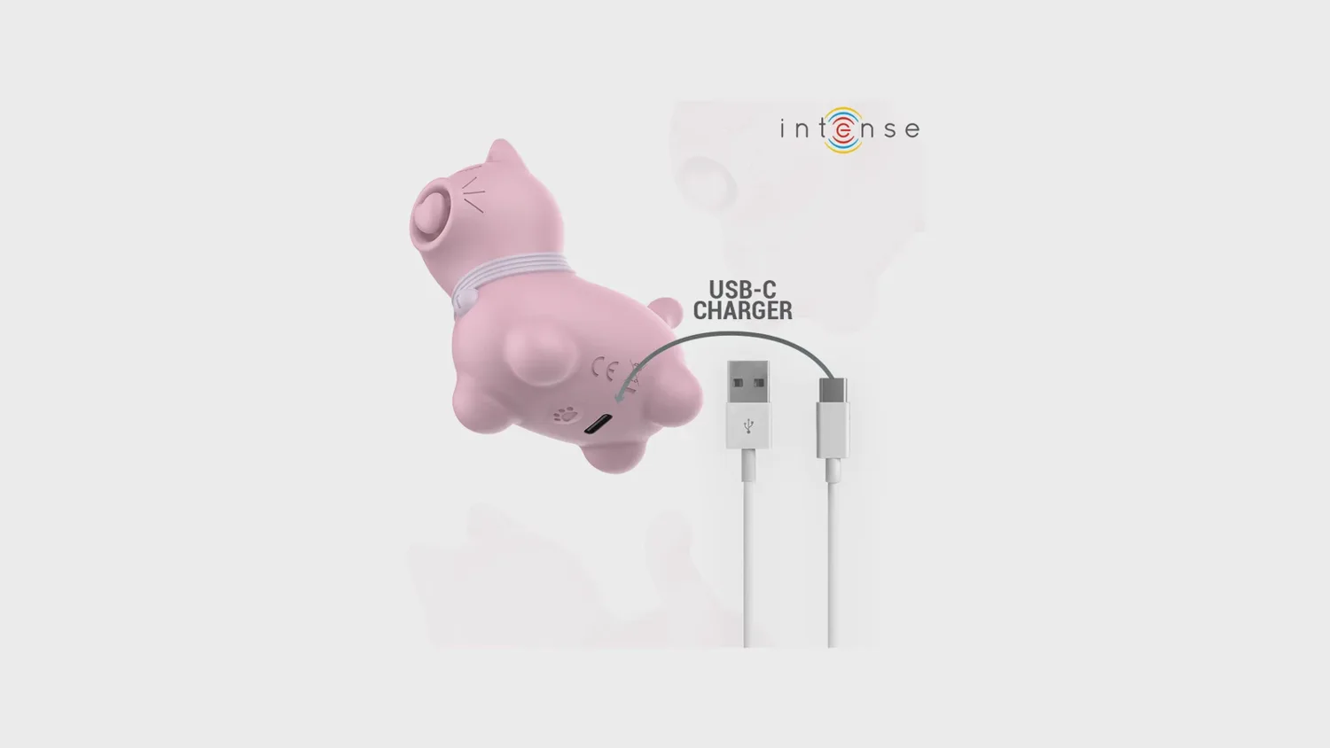 Stimulateur à tapotements Marie d'Intense, petit chat rose en silicone avec son câble de charge USB