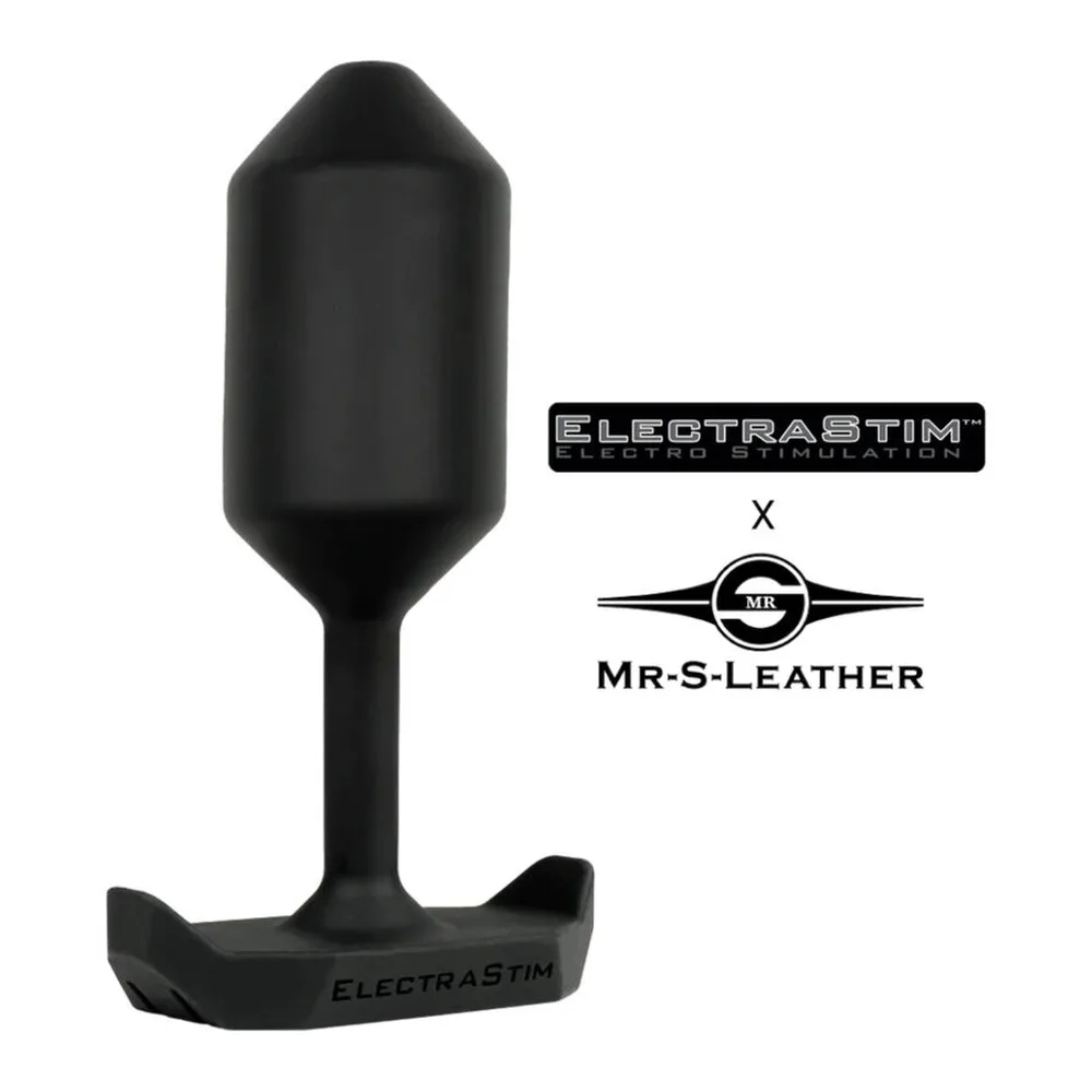 Plug anal noir en silicone avec noyau d'acier, boîtier de contrôle noir et câble de connexion rouge et noir sur fond blanc