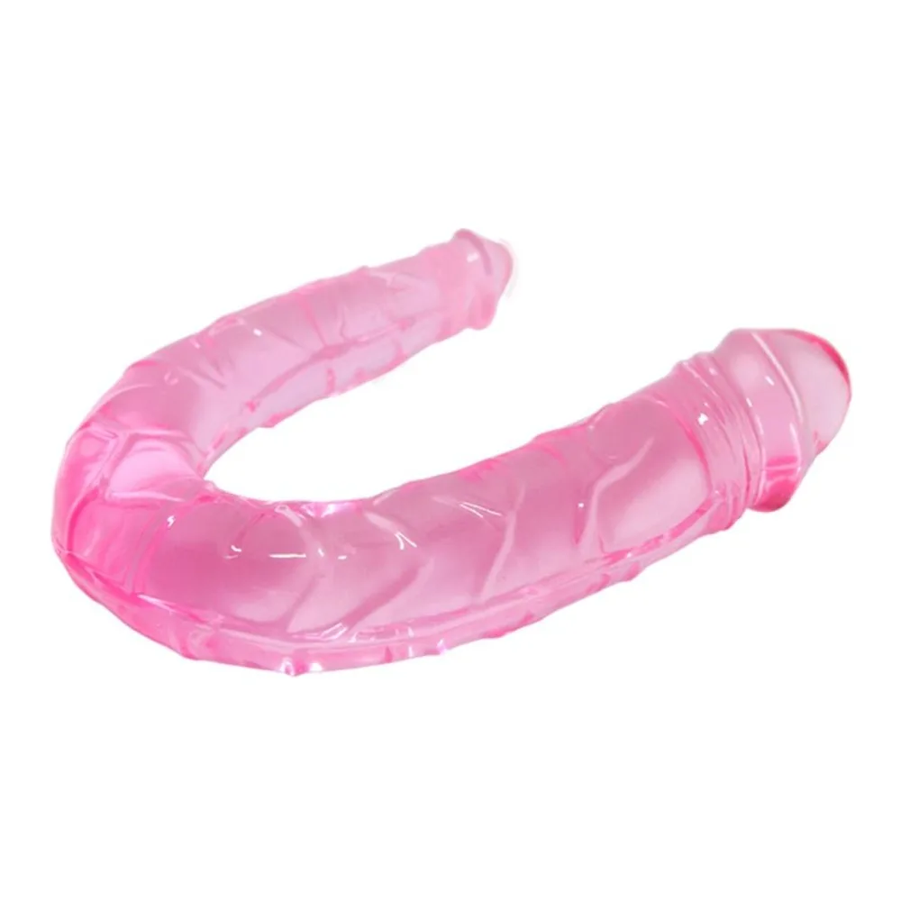 Double gode en silicone rose translucide, forme courbée en C avec deux extrémités arrondies, sur fond blanc