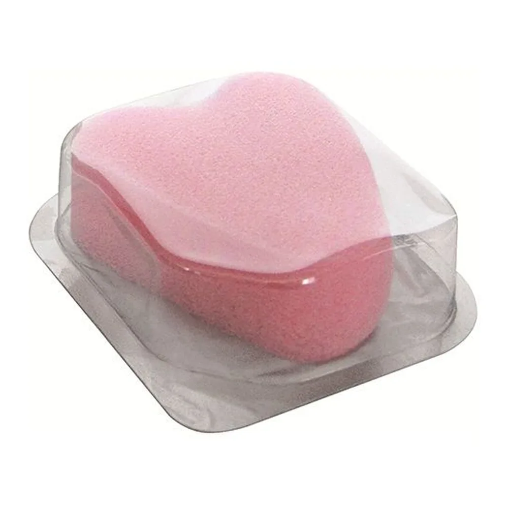 Tampon-éponge rose clair de forme triangulaire arrondie avec languette de traction intégrée, en mousse souple sur fond blanc