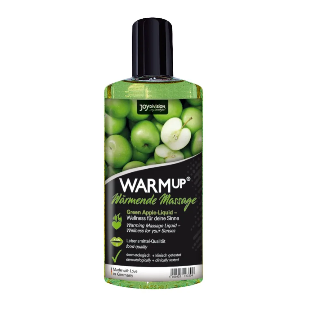 Flacon d'huile de massage Warmup parfum pomme verte avec étiquette noire et verte montrant des pommes fraîches, bouchon noir vissé