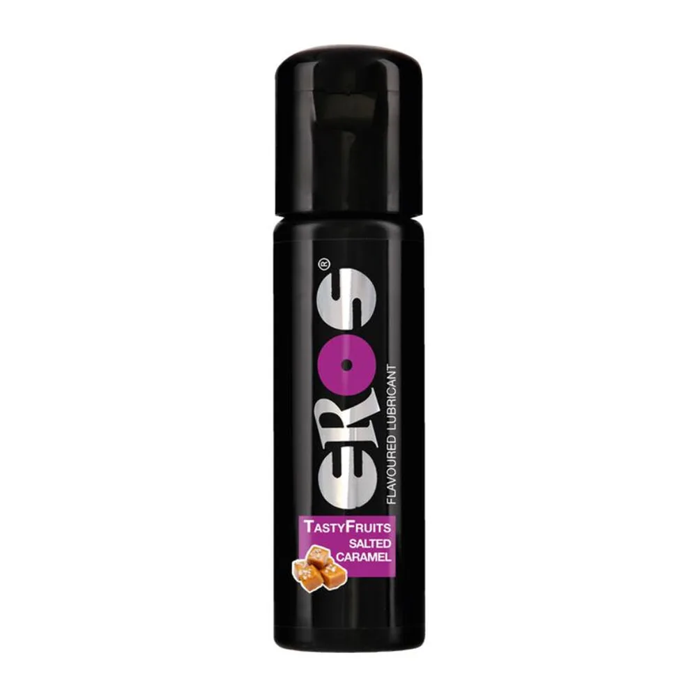 Flacon spray noir de lubrifiant aromatisé caramel salé, étiquette mauve avec logo EROS et mention TastyFruits, compatible latex