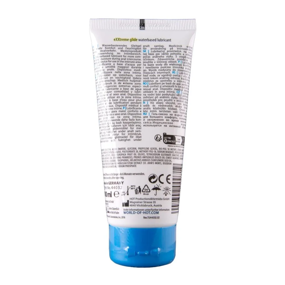 Tube de lubrifiant Exxtreme Glide blanc et bleu de 100 ml, étiqueté à base d'eau, compatible latex, sur fond blanc