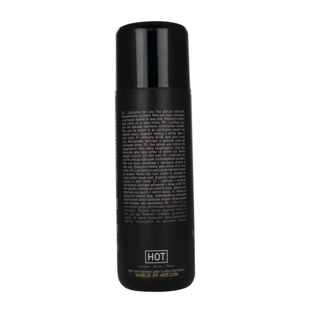 Flacon noir de lubrifiant Exxtreme Glide de la marque HOT, avec étiquette texte grise et logo blanc en bas