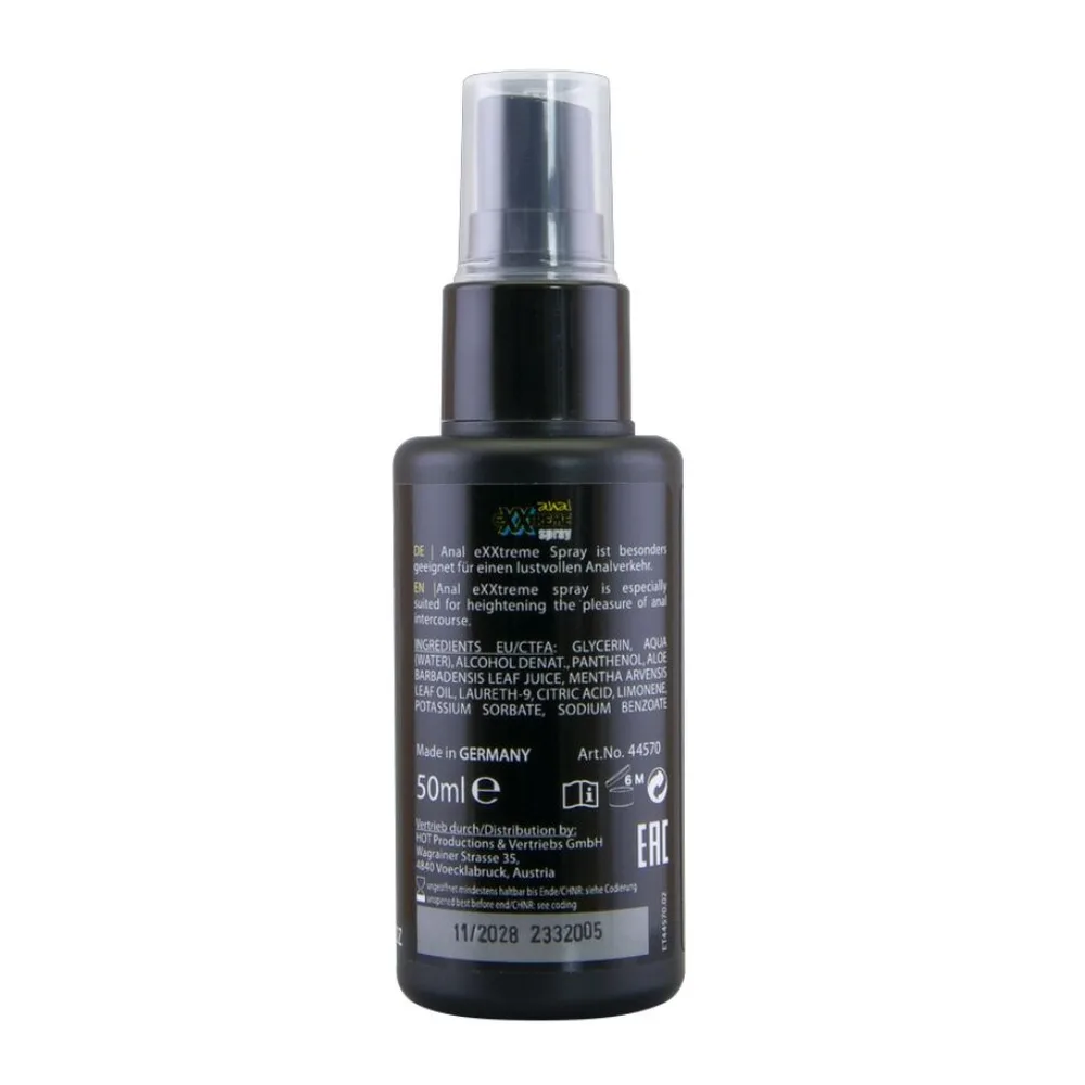 Flacon vaporisateur noir de 50 ml avec bouchon transparent, étiquette multilingue détaillant la composition et le mode d'application du spray anal