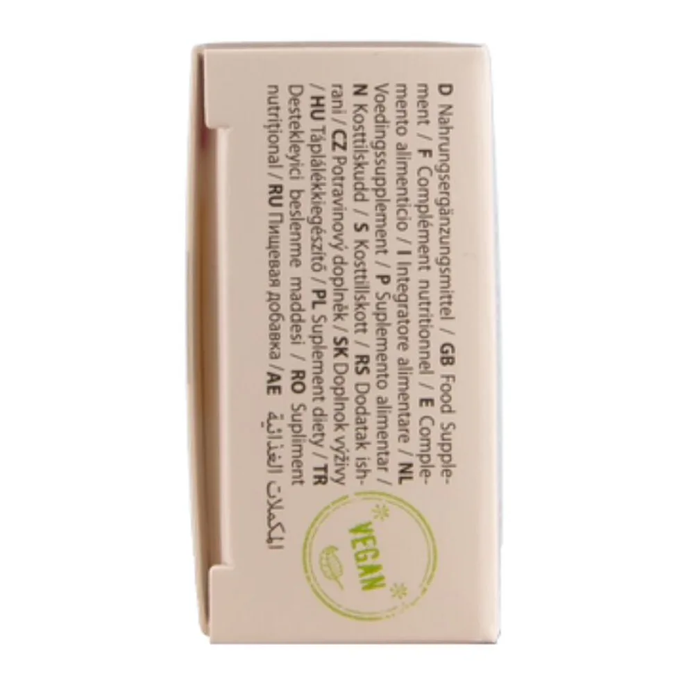 Emballage beige d'un complément alimentaire avec inscription noire, logo vert « VEGAN » et composition détaillée visible sur la face avant