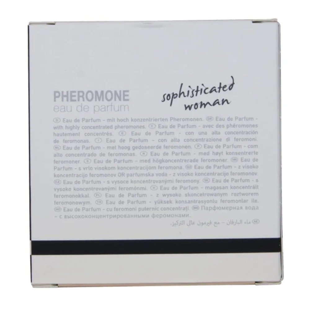 Flacon de parfum cylindrique transparent avec bouchon pulvérisateur chromé, contenant un liquide clair. L'étiquette affiche « LONDON sophisticated woman » en lettres argentées sur fond miroir