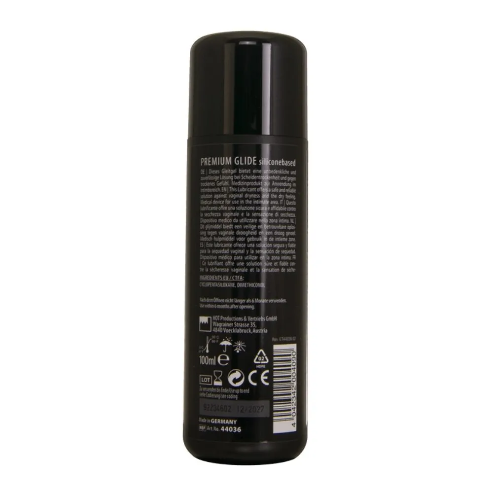 Flacon noir de lubrifiant silicone HOT avec bouchon à pompe, étiquette noire avec texte blanc et logo HOT visible au dos
