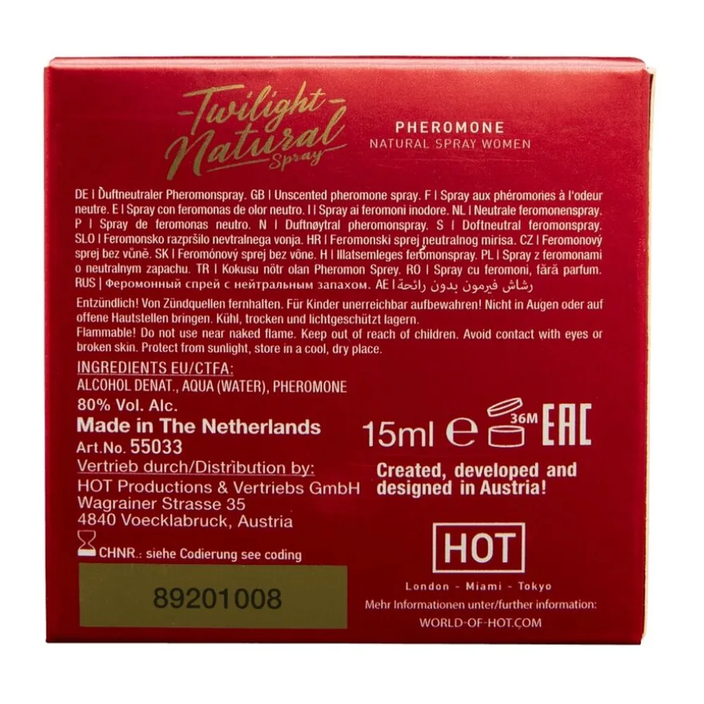 Flacon de spray phéromone Twilight Naturelle rouge et or de 15 ml, avec son emballage assorti aux teintes rouges et dorées