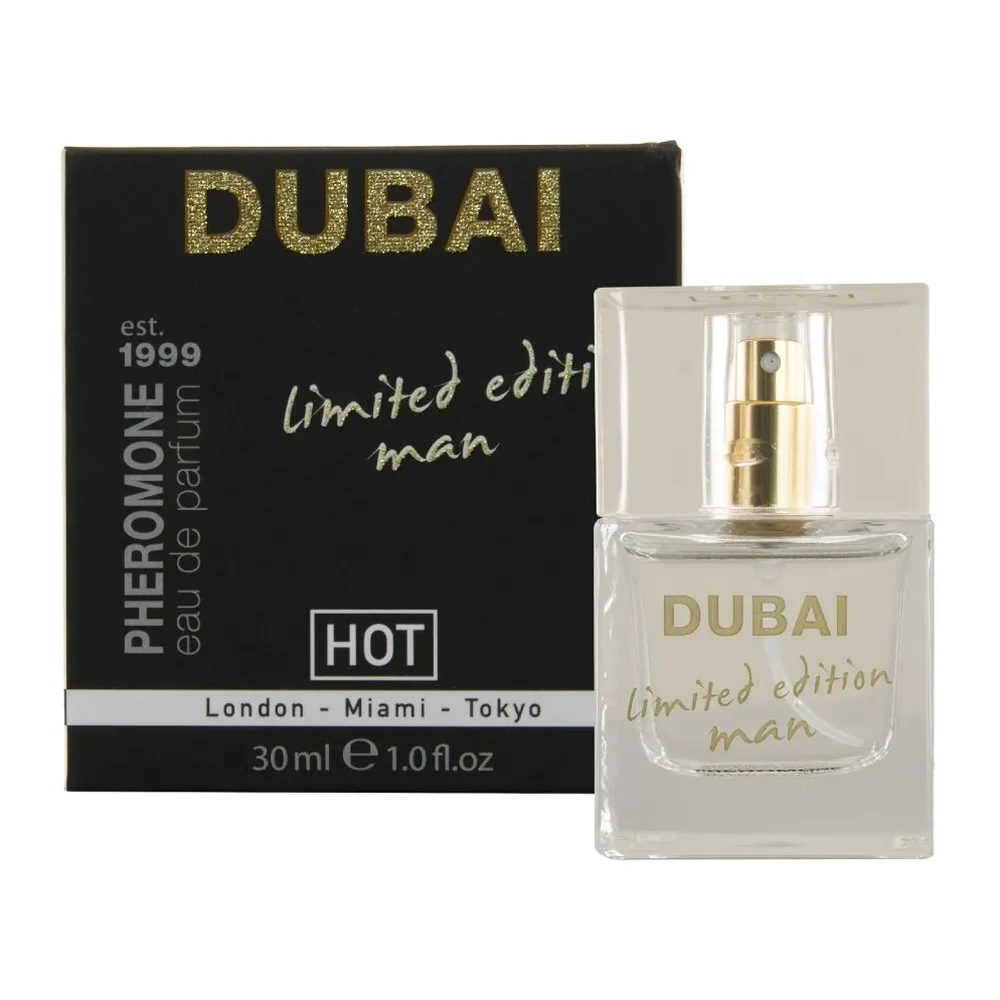 Flacon de parfum aux phéromones Dubai limited edition man, verre transparent avec bouchon vaporisateur doré, liquide incolore, étiquette gravée en lettres dorées