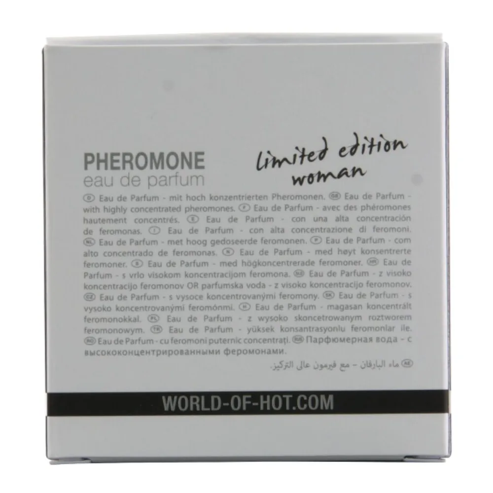 Flacon de parfum aux phéromones transparent avec bouchon vaporisateur doré, étiquette blanc crème gravée DUBAI limited edition woman