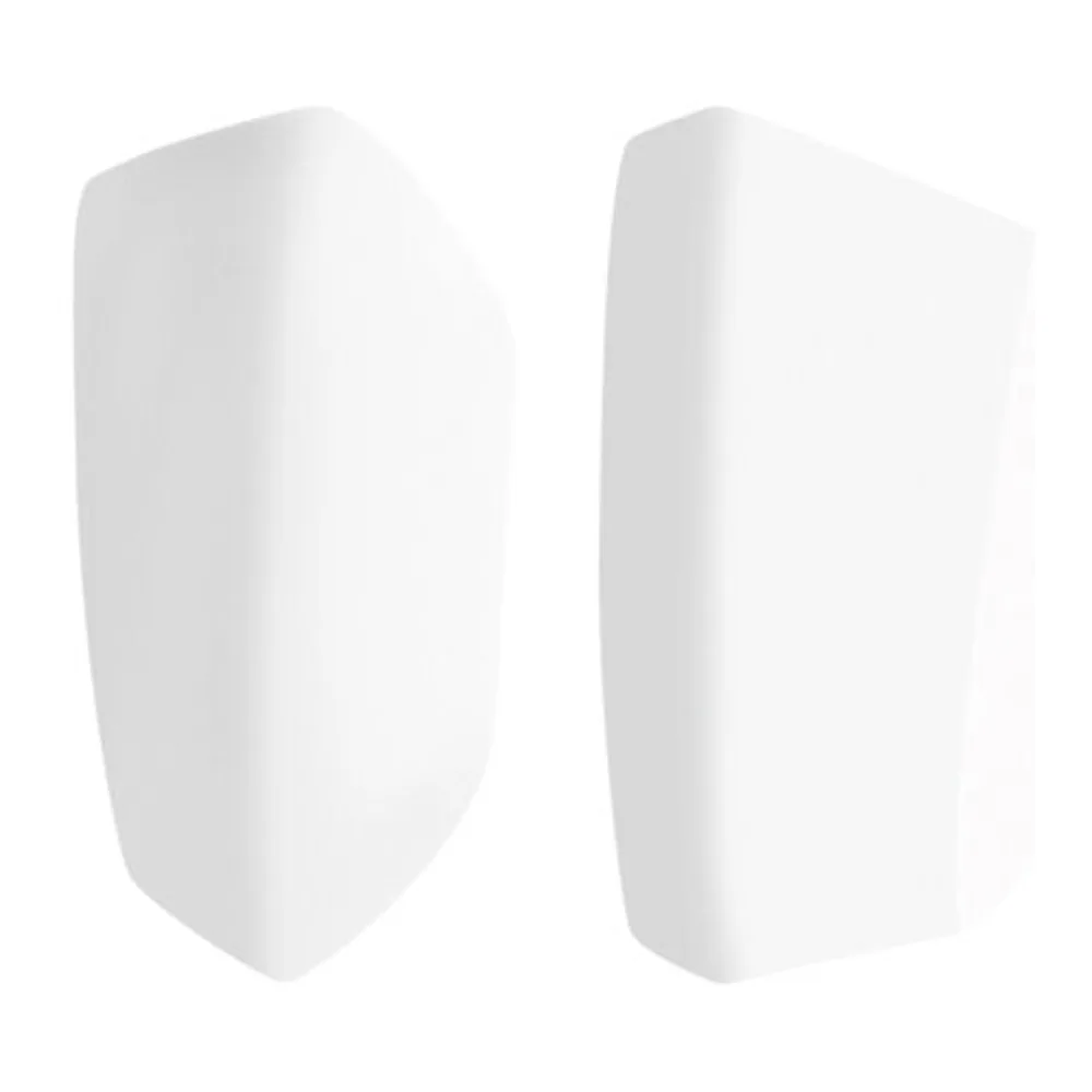 Deux capuchons blancs en silicone de forme arrondie, présentés de profil sur fond blanc