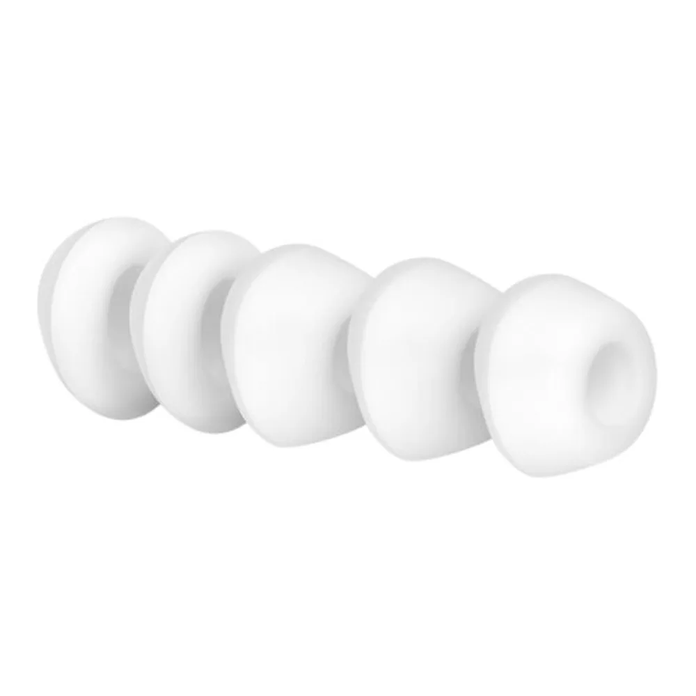 Deux capuchons blancs en silicone de forme arrondie, présentés de profil sur fond blanc