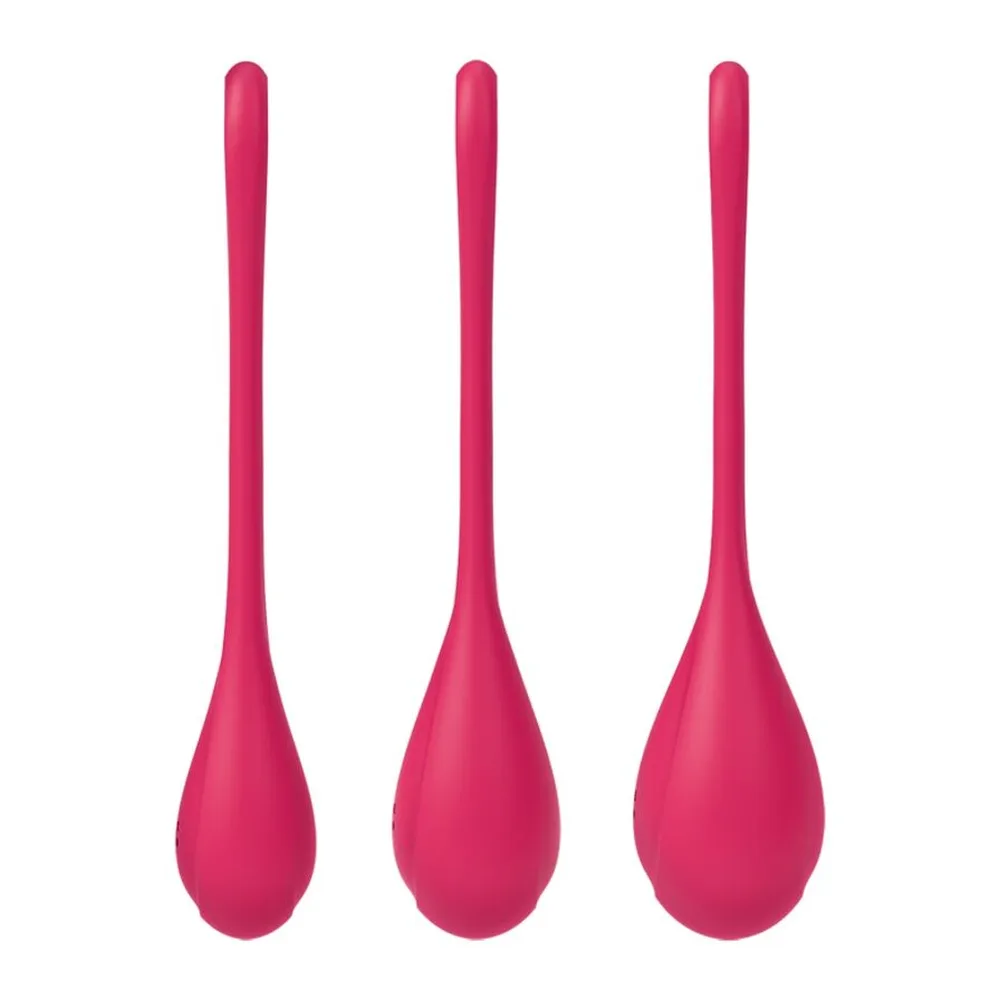 Trois boules de geisha en silicone blanc avec anses grises, disposées en diagonale de la plus grande à la plus petite, sur fond blanc