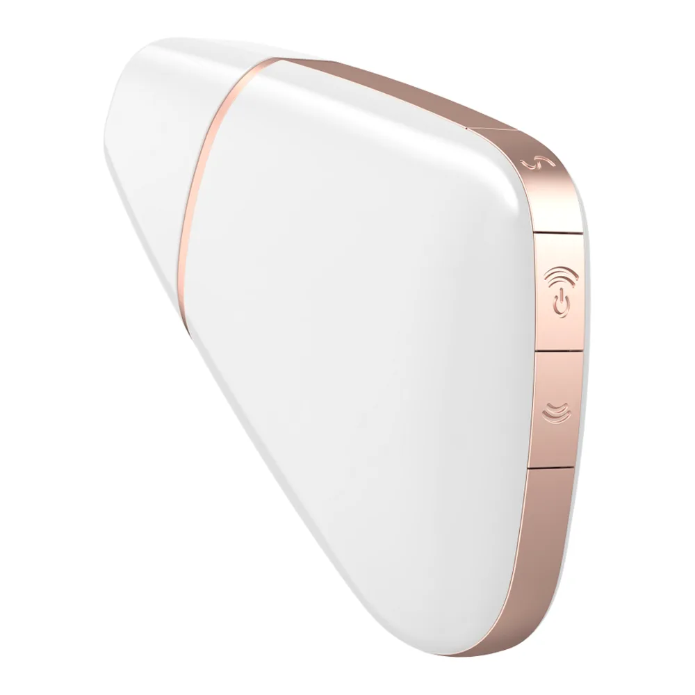 Stimulateur clitoridien blanc et rose poudré de forme oblongue, vue de dessus montrant la bande de contrôle centrale avec symboles de modes et bouton marche-arrêt