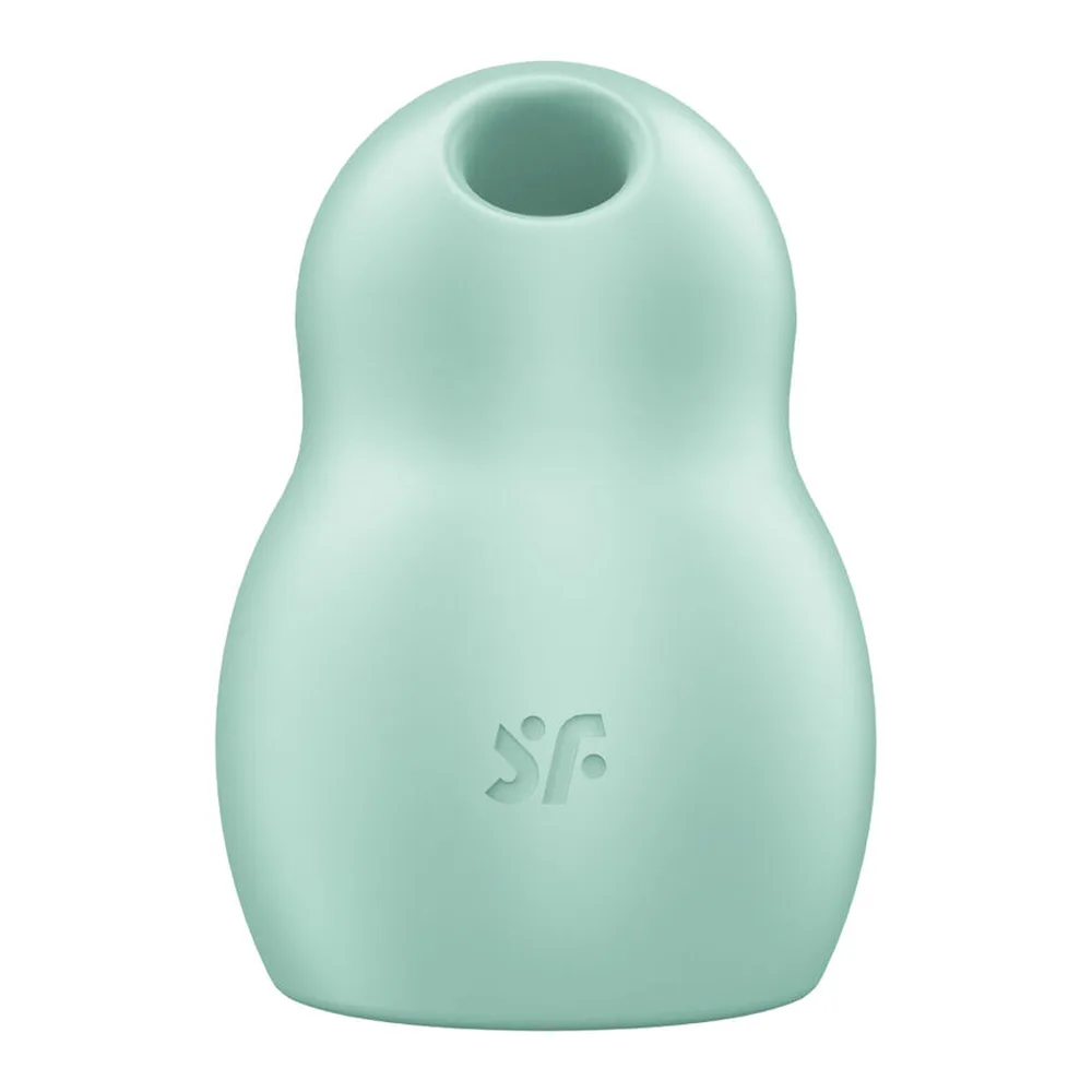 Stimulateur en silicone vert menthe, forme organique arrondie avec ouverture supérieure, logo gravé, accompagné d'un pictogramme indiquant les fonctions air pulsé et vibration 2 en 1