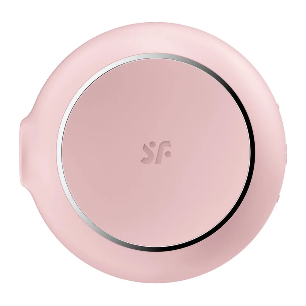 Stimulateur rose poudré de forme ronde avec ouverture latérale, accompagné d'un schéma montrant ses deux fonctions air pulsé et vibration