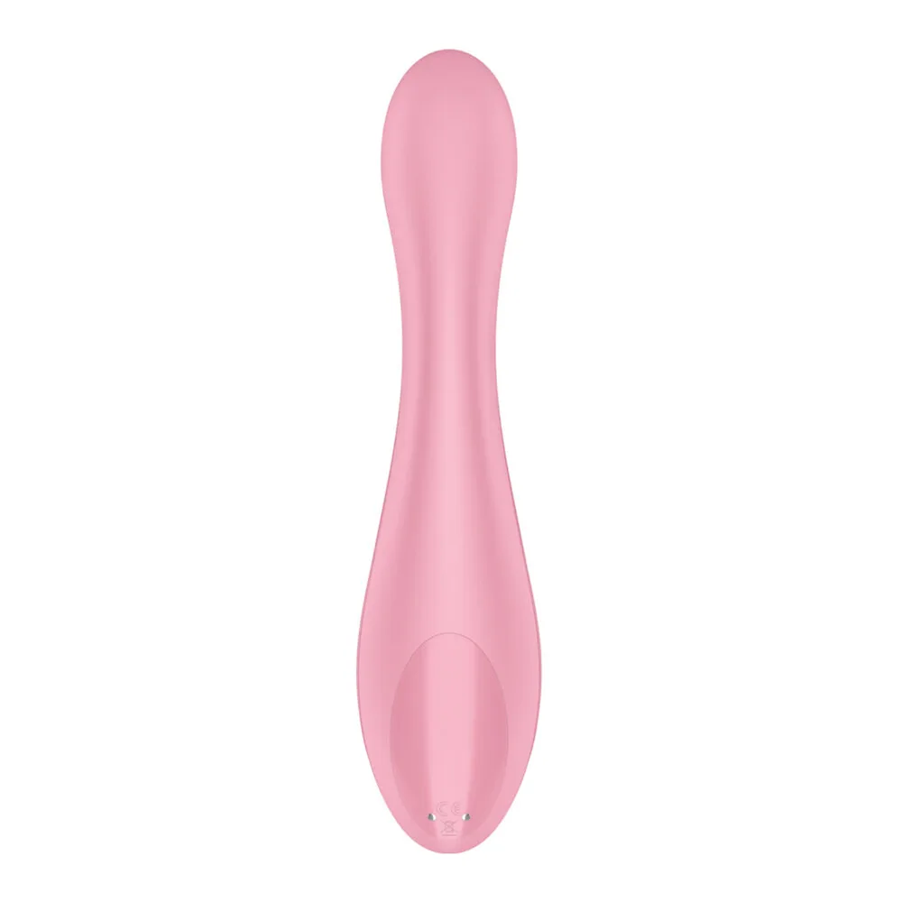 Vibromasseur rose clair à corps courbé et strié, extrémité aplatie arrondie, fond blanc