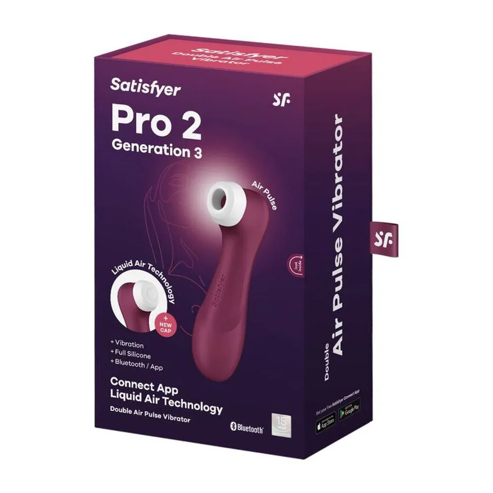 Stimulateur clitoridien rouge lie de vin avec corps ergonomique et embout blanc, accompagné de trois embouts de rechange blancs et d'un badge « NEW CAP »