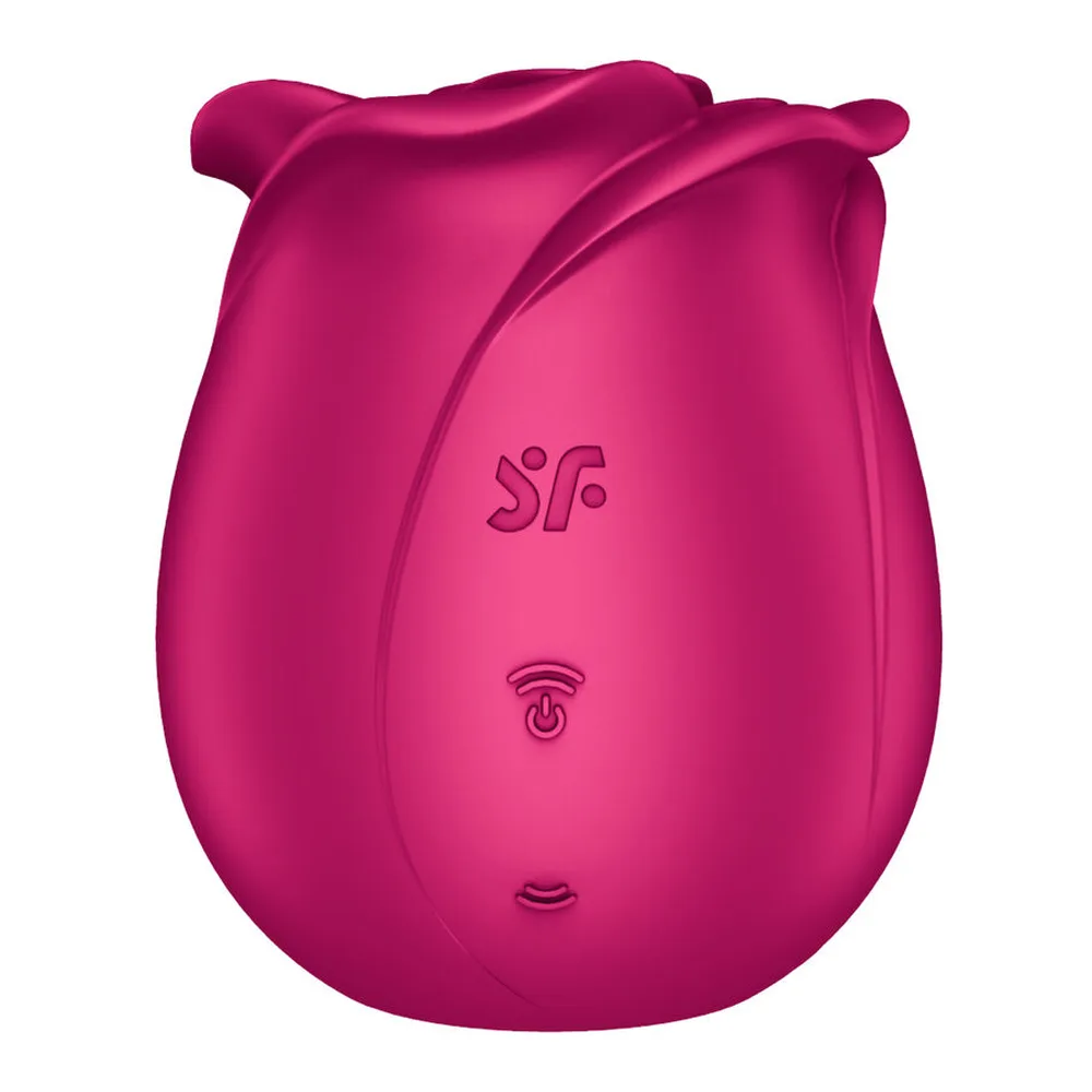 Stimulateur clitoridien en silicone rose vif en forme de bouton de rose fermé, avec accessoires interchangeables montrés séparément : capuchon et anneau d'ouverture, symboles de commande visibles sur le corps