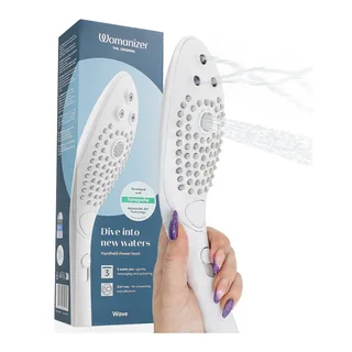 Wave Pommeau de Douche Stimulant Clitoridien Womanizer - détail de la texture - Blanc