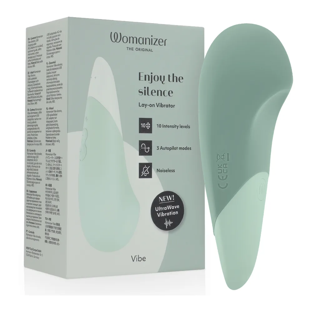 Stimulateur clitoridien en silicone vert menthe à bout arrondi, tenu en main, design ergonomique lisse