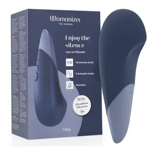 Vibe Lay-On Vibrateur Silencieux Womanizer - avec sa base