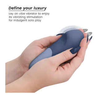 Vibe Lay-On Vibrateur Silencieux Womanizer - avec son échelle de taille