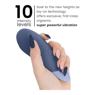 Vibe Lay-On Vibrateur Silencieux Womanizer - accessoires fournis