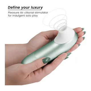 Stimulateur Clitoridien a Air Womanizer - accessoires fournis - Vert