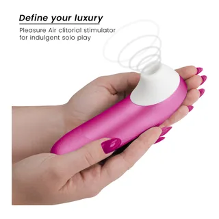 Stimulateur Clitoridien a Air Womanizer - accessoires fournis - Rose