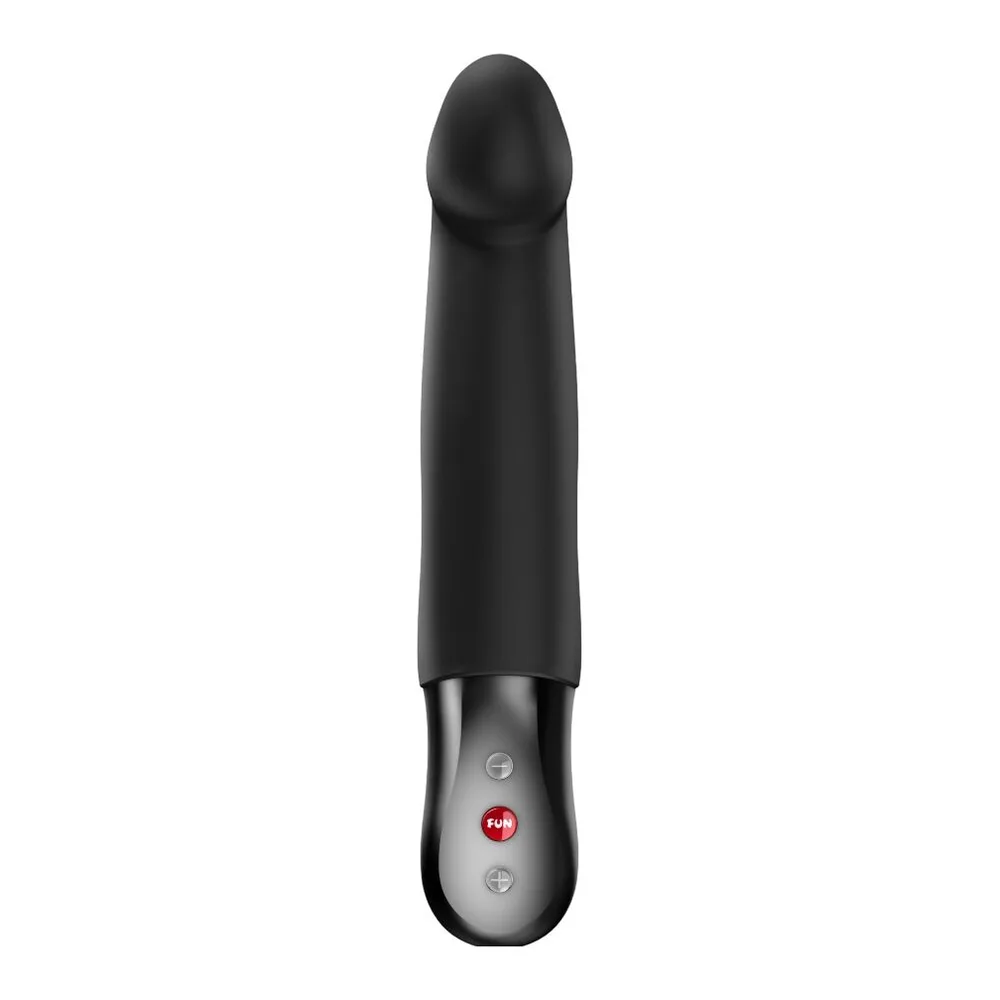 Stimulateur clitoridien noir en silicone, forme allongée avec pointe arrondie, base large avec boutons de contrôle, sur fond blanc