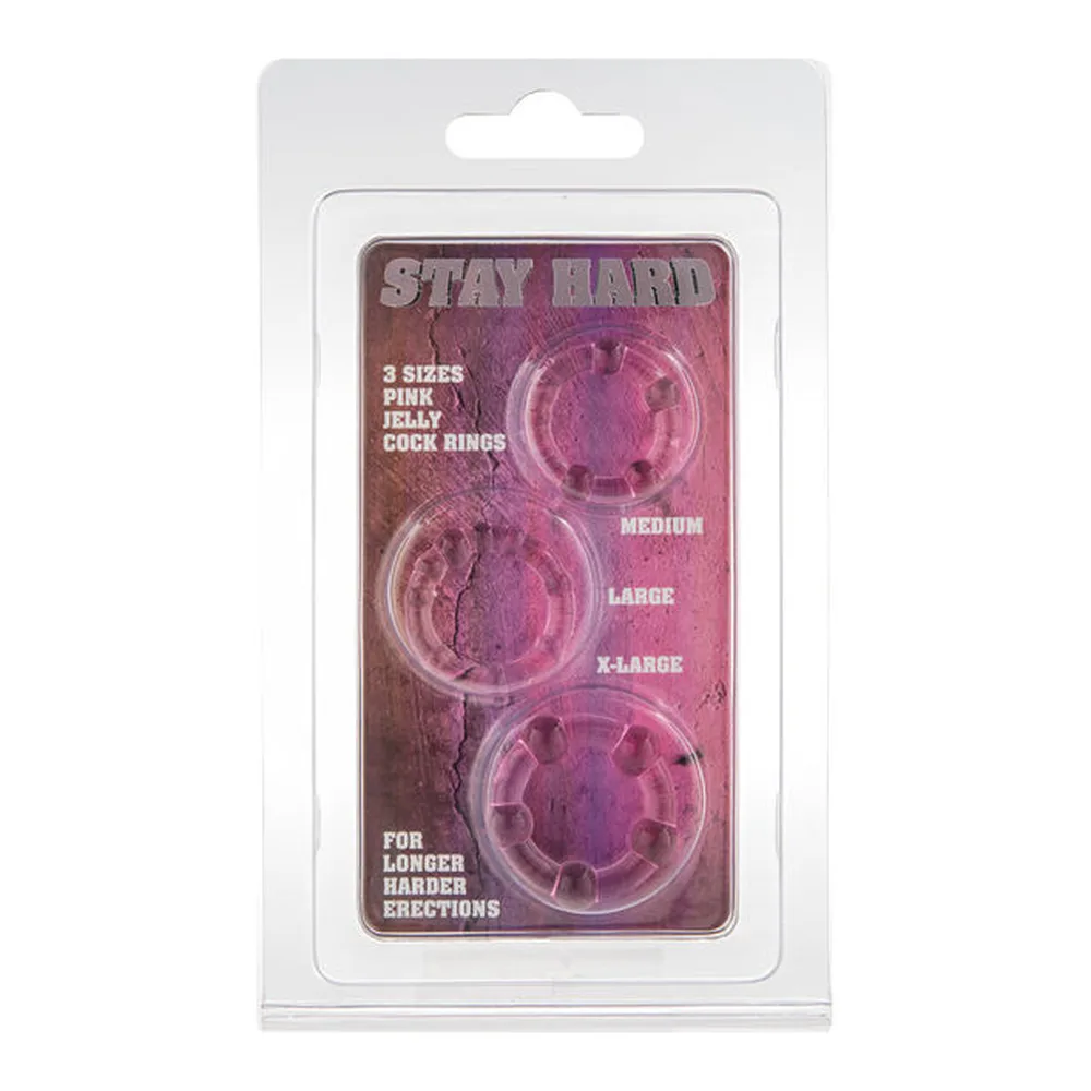 Trois anneaux pénis en silicone rose, de diamètres différents, composés de perles arrondies articulées avec séparateurs, sur fond blanc