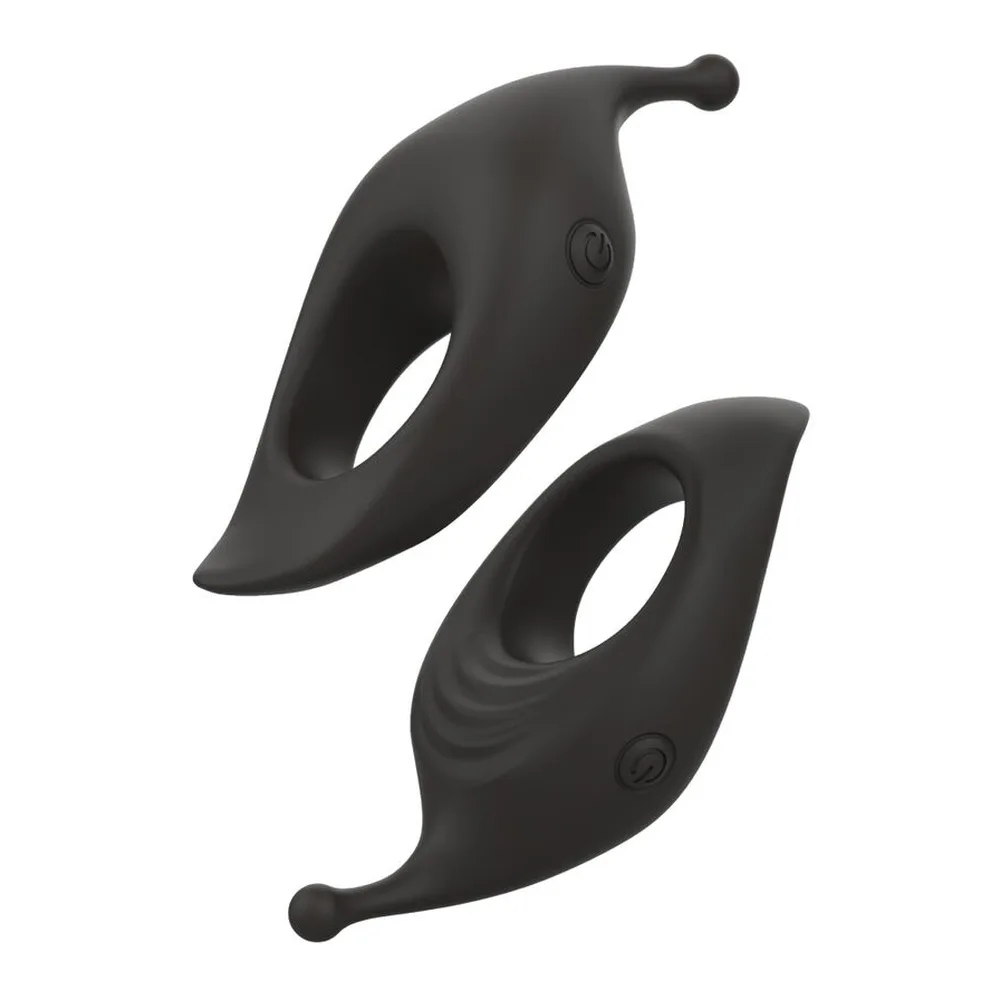 Deux anneaux vibrants en silicone noir avec prolongement effilé et boutons de commande, sur fond blanc