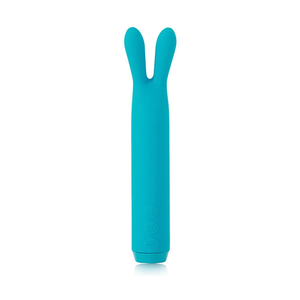 Vibromasseur turquoise avec deux oreilles souples divergentes au sommet et corps cylindrique lisse sur fond blanc