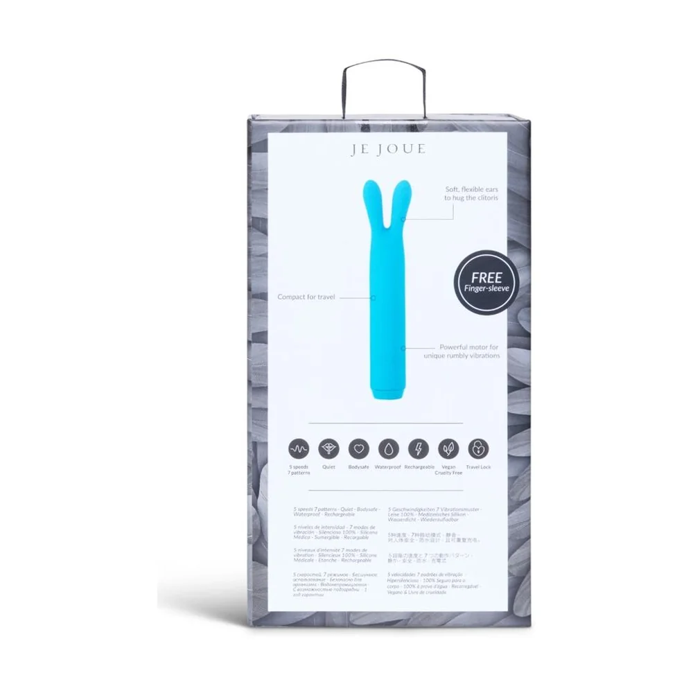 Vibromasseur turquoise avec deux oreilles souples divergentes au sommet et corps cylindrique lisse sur fond blanc