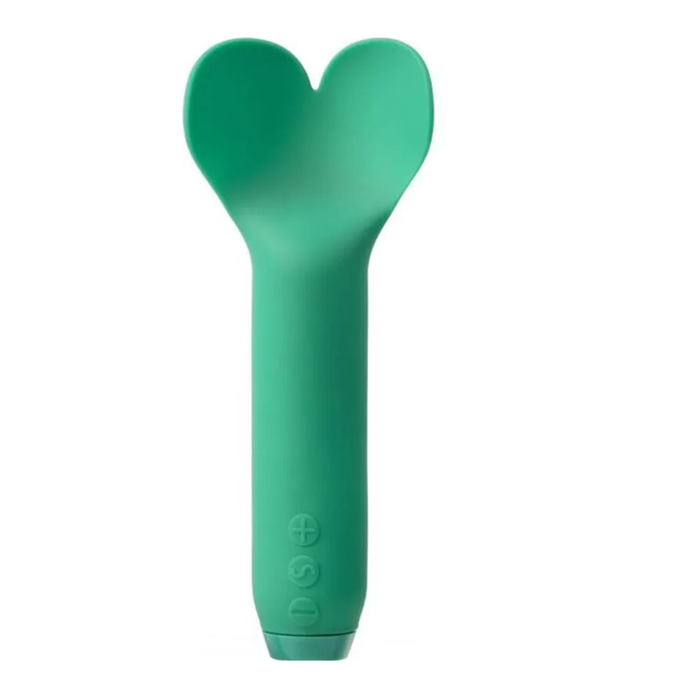 Mini-vibromasseur vert menthe en silicone avec tête en forme de cœur et manche cylindrique texturisé, sur fond blanc