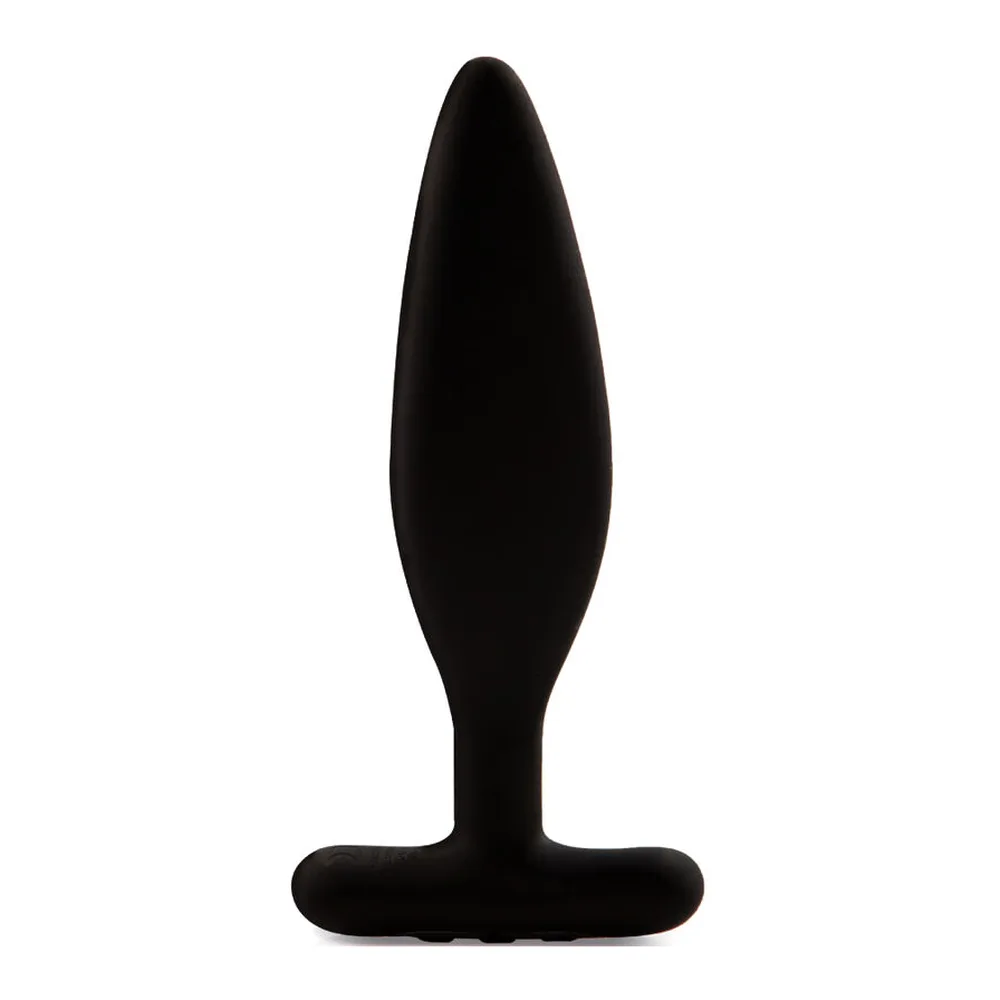 Plug anal noir en silicone de forme allongée avec base élargie en T, silhouette lisse sur fond blanc