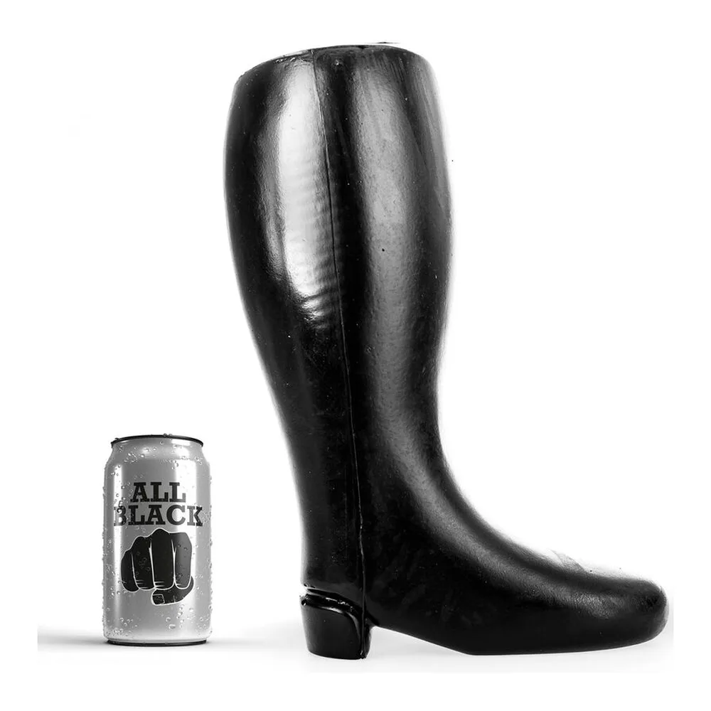 Botte noire en TPR souple avec talon bas, présentée à côté d'une canette pour l'échelle de taille