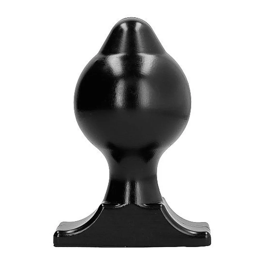 Plug anal noir brillant en silicone avec base plate évasée, présenté à côté d'une canette de référence pour l'échelle, fond blanc