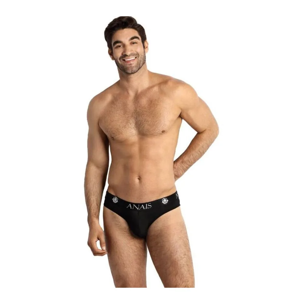 Slip noir Eros porté, tulle extensible avec large ceinture élastique marquée du logo, coupe classique sur fond blanc