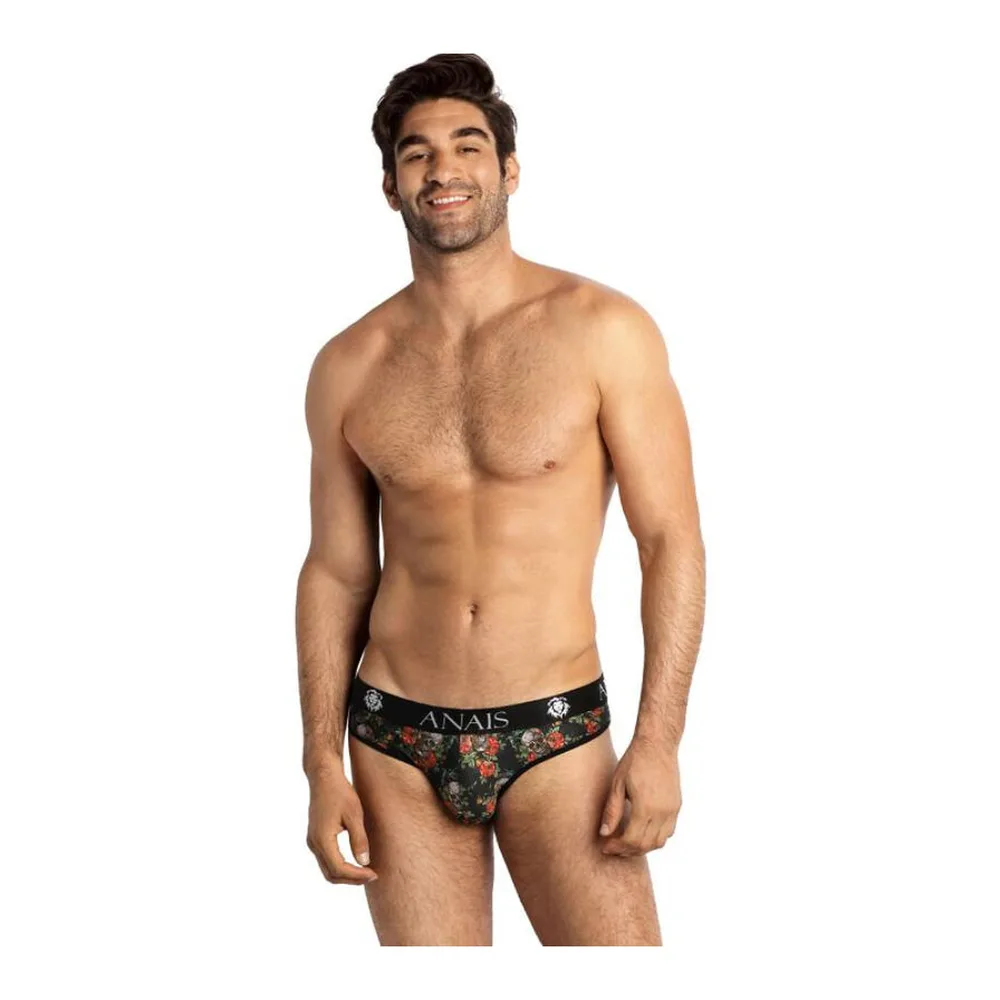 Slip homme noir avec motif floral crânes et roses rouges, marque Anaïs visible à la ceinture, porté par un homme sur fond blanc