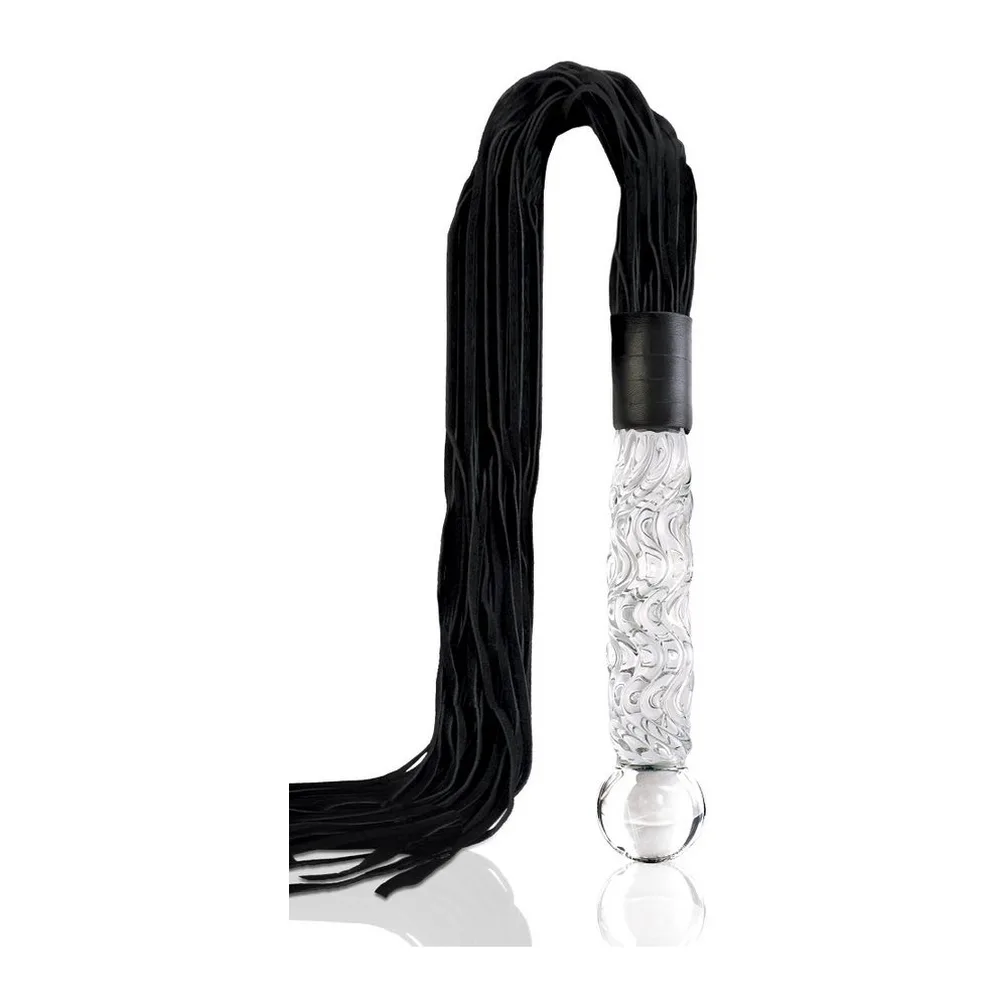Masseur en verre transparent motifs ondulés, manche de 17 cm, prolongé par un rideau de lanières noires souples, embout métallique gris, sur fond blanc