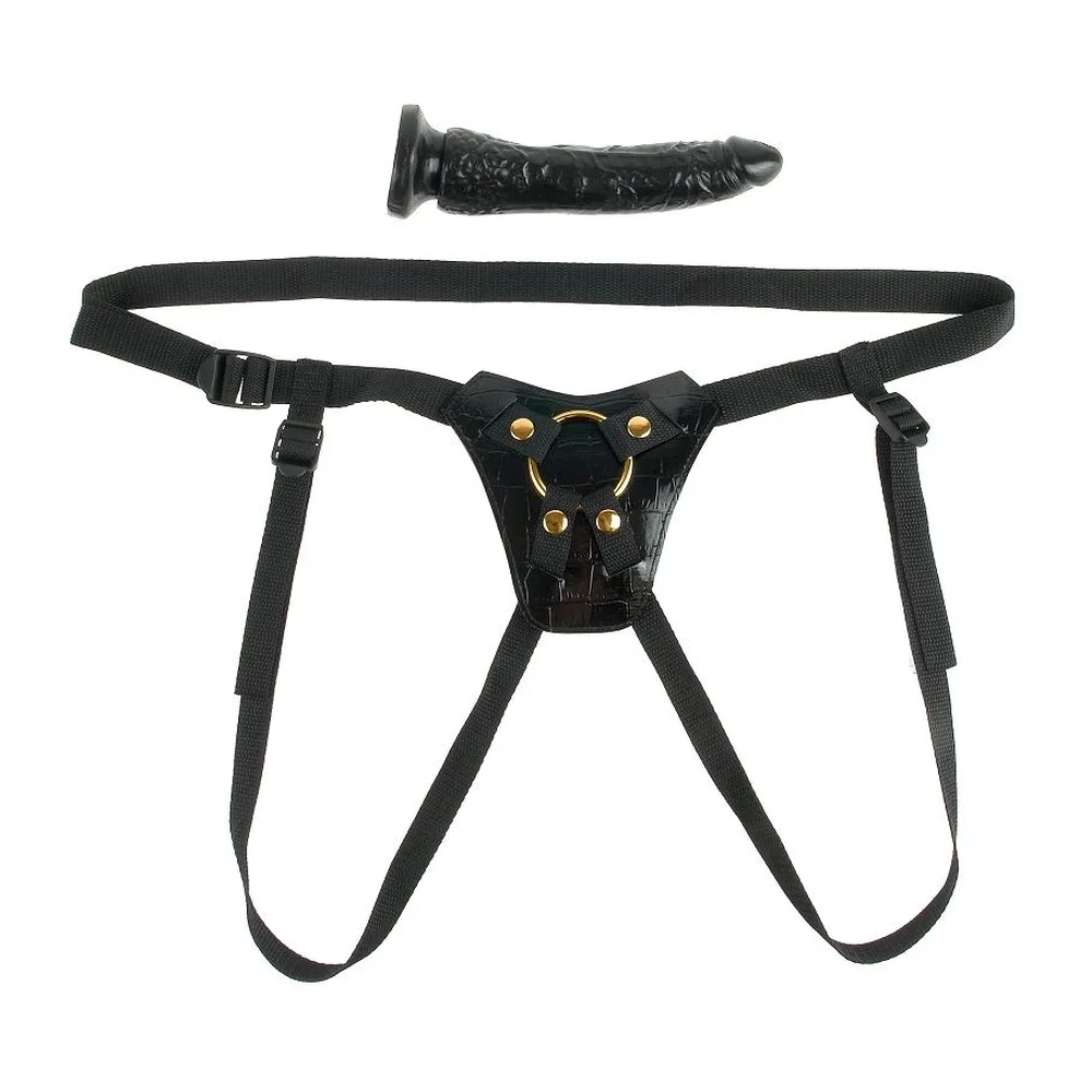 Ensemble strap-on noir composé d'un harnais ajustable avec ceinture et bretelles en nylon, boucles métalliques dorées, et gode noir texturé à anneau amovible