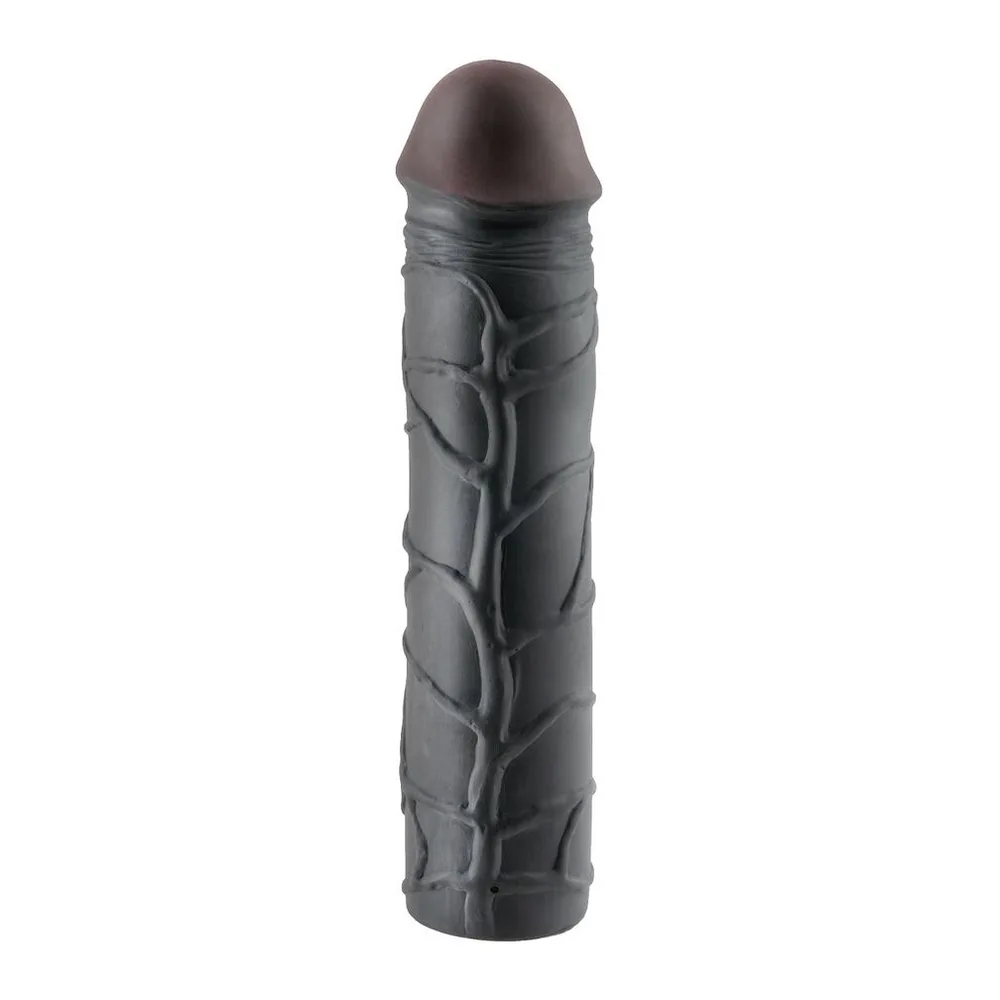 Rallonge noire en silicone avec sommet arrondi brun, corps cylindrique texturé de motifs en relief, fond blanc