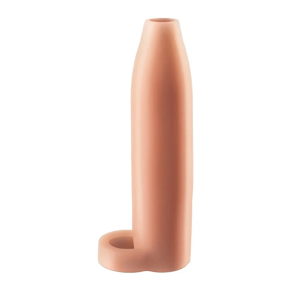 Boîte de la gaine Real Feel Enhancer XL en silicone chair, 7 pouces, avec étui transparent et sangle testiculaire, vue de face sur fond blanc