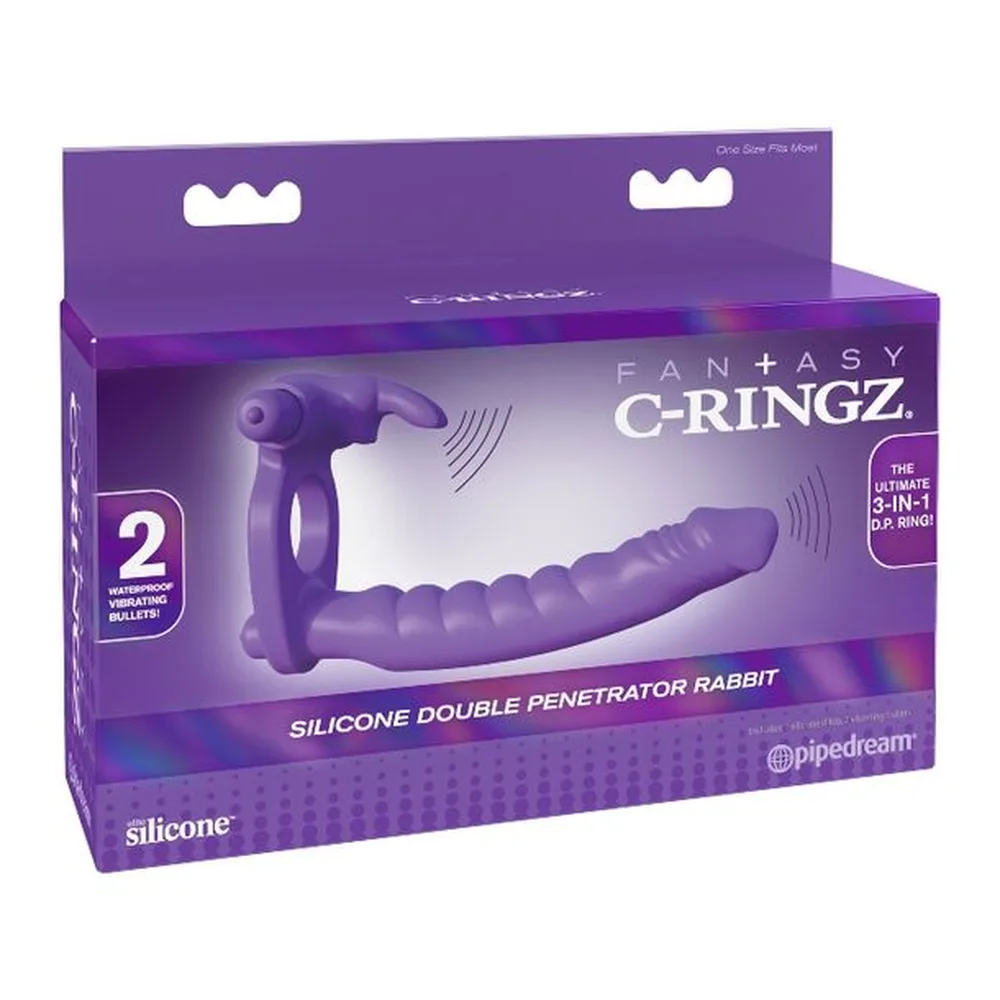 Cockring violet en silicone avec anneau de base, gode nervuré et stimulateur clitoridien, sur fond blanc